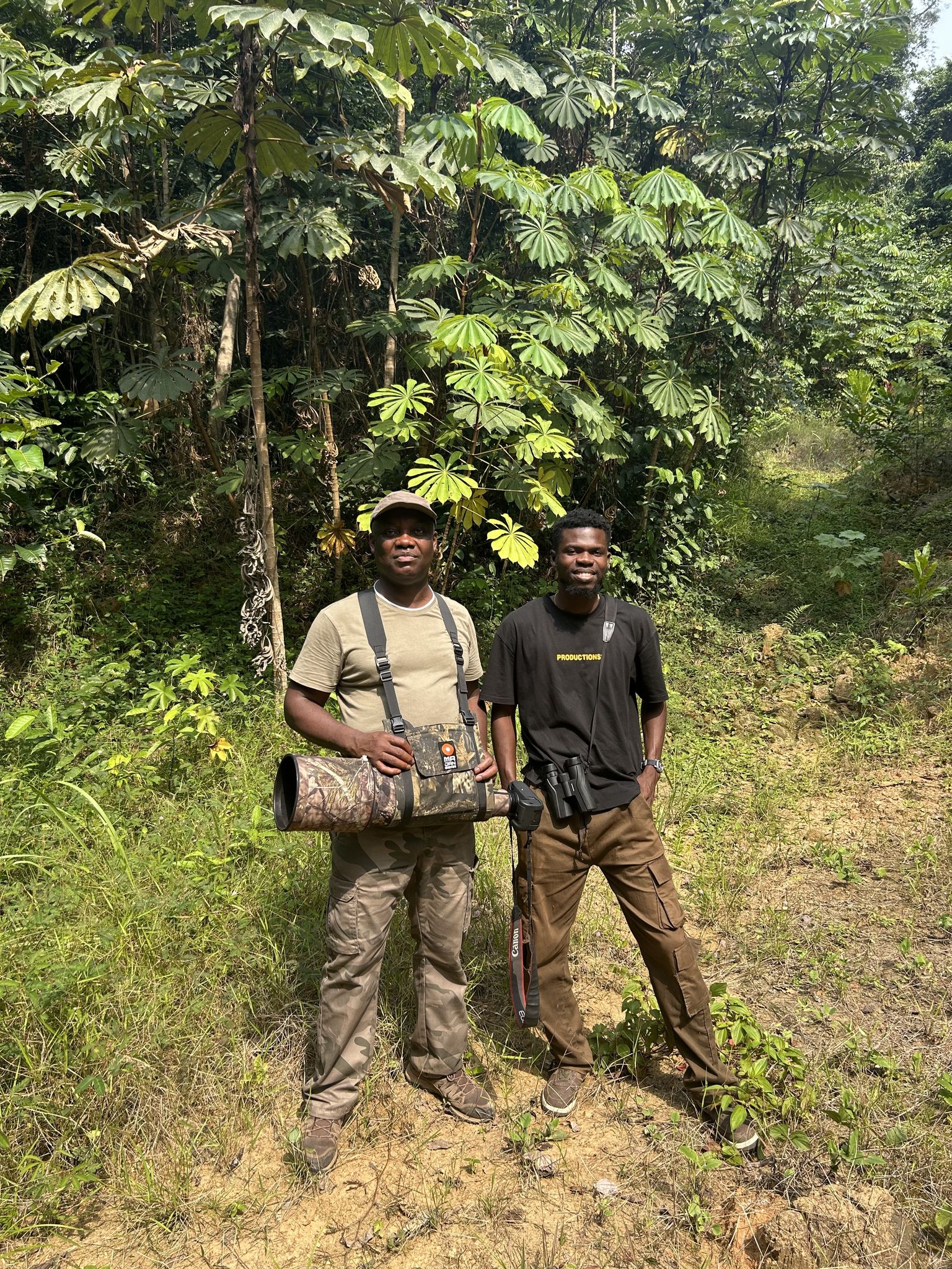 Prince in the field during a photography tour in Ghana