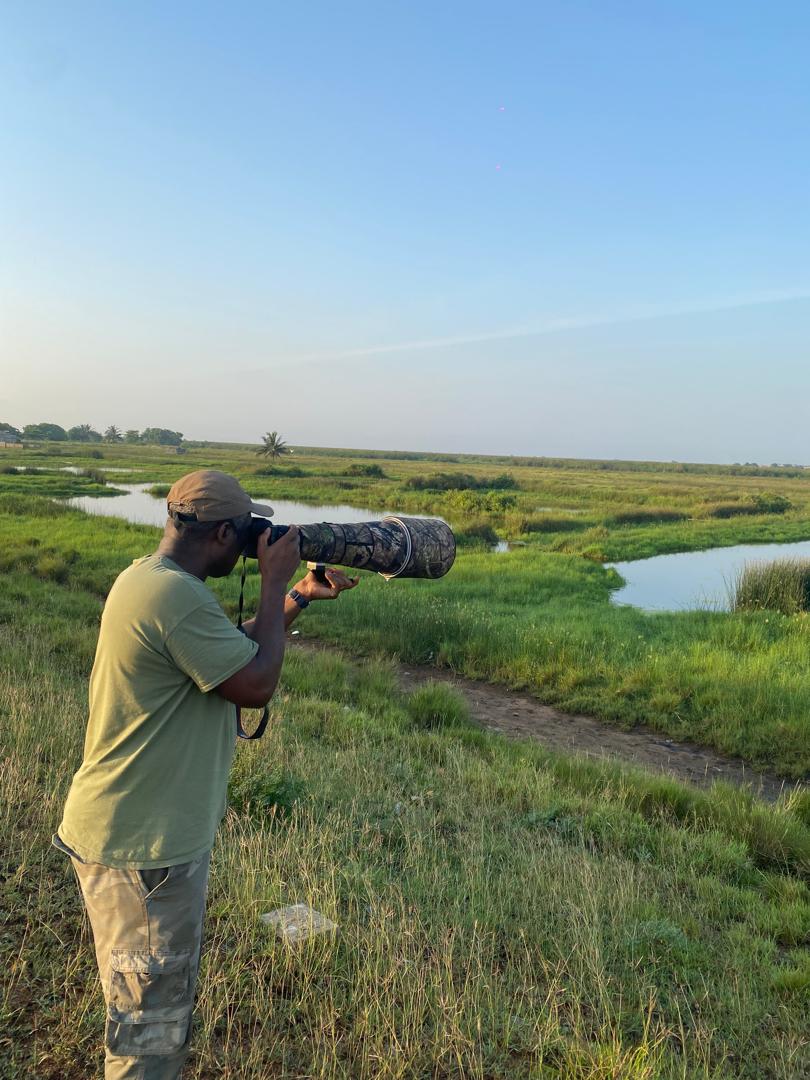Tracking birds at the river's edge in Ghana